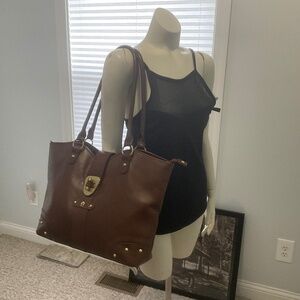 Etienne Aigner leather purse.Brown